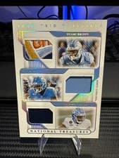 Dyami Brown / Javonte Williams / Michael Carter 2021 Panini National Treasures Collegiate card