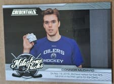 2024-25 Upper Deck Credentials Milestone Pucks Connor McDavid #MP-CM card