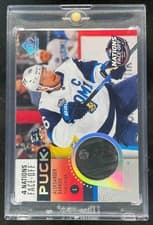 2025-26 SP Game Used 2025 4 Nations Face-Off Puck Relics Aleksander Barkov #4NP-AB card
