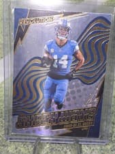 2025 Panini Revolution Shock Wave Amon-Ra St. Brown #46
