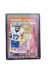Torry Holt / Puka Nacua 2024 Donruss Passing the Torch card
