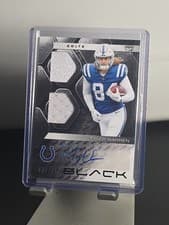 Tyler Warren 2025 Panini Black Rookie Signature Materials card