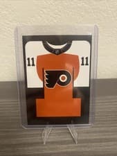 2024-25 Upper Deck Credentials Arena Giveaways - Jerseys Travis Konecny #J-TK card