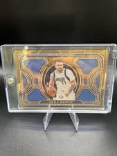 2024-25 Panini National Treasures Treasured Metals Luka Doncic #7 card