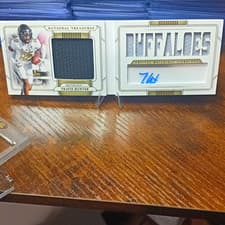 2025 Panini National Treasures Material Treasures Signatures Travis Hunter #27 card
