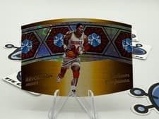 2024-25 Panini Revolution Ring Bearers Hakeem Olajuwon #13