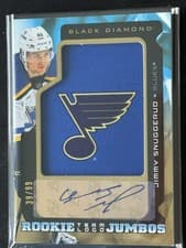 2025-26 Upper Deck Black Diamond Rookie Team Logo Jumbo Patch Auto Jimmy Snuggerud #RTL-JS card