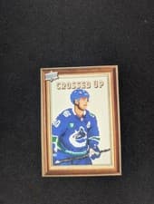 2024-25 Upper Deck Crossed Up Elias Pettersson #CU-9 card