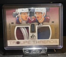 2025-26 SP Game Used Troupe Threads Nathan MacKinnon/Cale Makar #TT-MR card