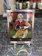 2025 Panini Select Score Select Throwback Christian McCaffrey #7 card