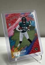 2025 Panini Rookies & Stars Artistry in Motion Travis Hunter #8 card