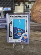 2024-25 Upper Deck Black Diamond Team Logo Jumbo Patch Puzzle - Islanders Brock Nelson #TL-BN card