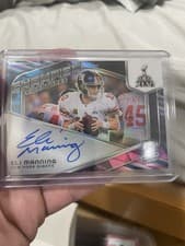 2024 Panini Spectra Champion Signatures Eli Manning #CS-EMG card