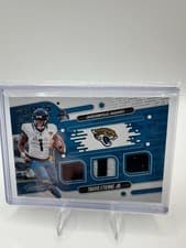 Travis Etienne Jr. 2024 Panini Absolute Tools of the Trade Triple card
