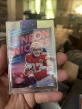 Travis Kelce 2024 Panini Spectra Neon Nights card