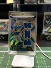 2022 Panini XR Rookie Triple Threats Materials Aidan Hutchinson #RTT-AH card