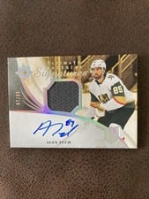2021-22 Upper Deck Ultimate Collection 2020 Update - Ultimate Material Signatures Alex Tuch #UMS-AT card