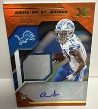 2021 Panini XR Rookie Swatch Autographs Amon-Ra St. Brown #RSA-ASB card