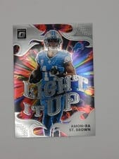 2025 Donruss Optic Light it Up Amon-Ra St. Brown #15 card