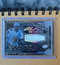 2023-24 SPx UD Black Obsidian Jerseys Brad Marchand #OJ-BM card