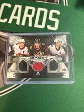 2022-23 Upper Deck Premier Premier Triple Jersey Brady Tkachuk/Tim Stutzle/Thomas Chabot #PT-TSC card