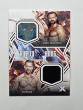 2025 Topps Exalted WWE Wrestling Rivaled Relics CM Punk/Drew McIntyre #RR-MP card