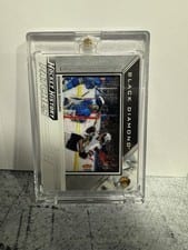 2024-25 Upper Deck Black Diamond Hockey History Patches Connor Bedard #HHP-CB card