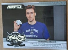 2024-25 Upper Deck Credentials Milestone Pucks Connor McDavid #MP-CM card