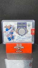 2023-24 Upper Deck Ultimate Collection Ultimate Emblems Autograph Evan Bouchard #UE-EB card