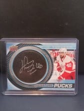 2022-23 Upper Deck Trilogy Signature Pucks Henrik Zetterberg #SP-HZ card