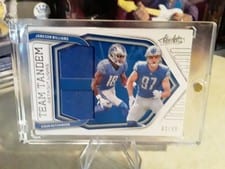 2022 Panini Absolute Team Tandem Materials Jameson Williams / Aidan Hutchinson #TT-JA card