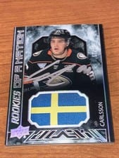 2023-24 SPx UD Black Pride of a Nation Autograph Patch Leo Carlsson #PON-CA card