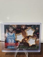 2025-26 Topps Holiday Holiday-Shaped Relics Liam McNeeley #HSR-24 card