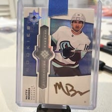 2022-23 Upper Deck Ultimate Collection Ultimate Emblems Autograph Matty Beniers #UE-MB card