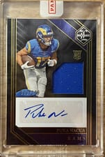 2023 Panini Limited Rookie Patch Autographs Puka Nacua #128 card