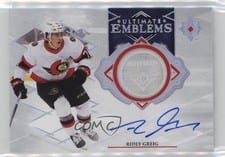 2023-24 Upper Deck Ultimate Collection Ultimate Emblems Autograph - Rookies Ridly Greig #UE-RG card