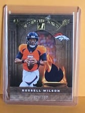 2022 Donruss Passing the Torch Jerseys Russell Wilson / John Elway #PTTJ-13 card