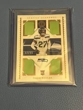 2022 Panini Encased Rookie Quad Memorabilia Tariq Woolen #RQM-35 card