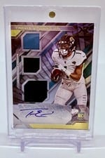 2021 Panini XR Rookie Triple Swatch Autographs Travis Etienne Jr #212 card