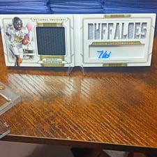 2025 Panini National Treasures Material Treasures Signatures Travis Hunter #27 card