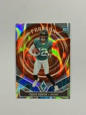 2025 Panini Phoenix Paragon Travis Hunter #12 card