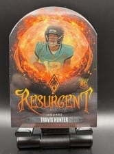 2025 Panini Phoenix Resurgent Snow Globe Travis Hunter #12 card
