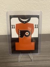 2024-25 Upper Deck Credentials Arena Giveaways - Jerseys Travis Konecny #J-TK card
