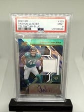 2022 Panini XR Rookie Triple Swatch Autographs Travon Walker #225 card